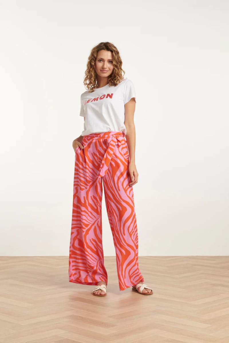25087 Wide Pants Met Dierenprint In Roze En Oranje 25087 Wide Pants Met Dierenprint In Roze En Oranje